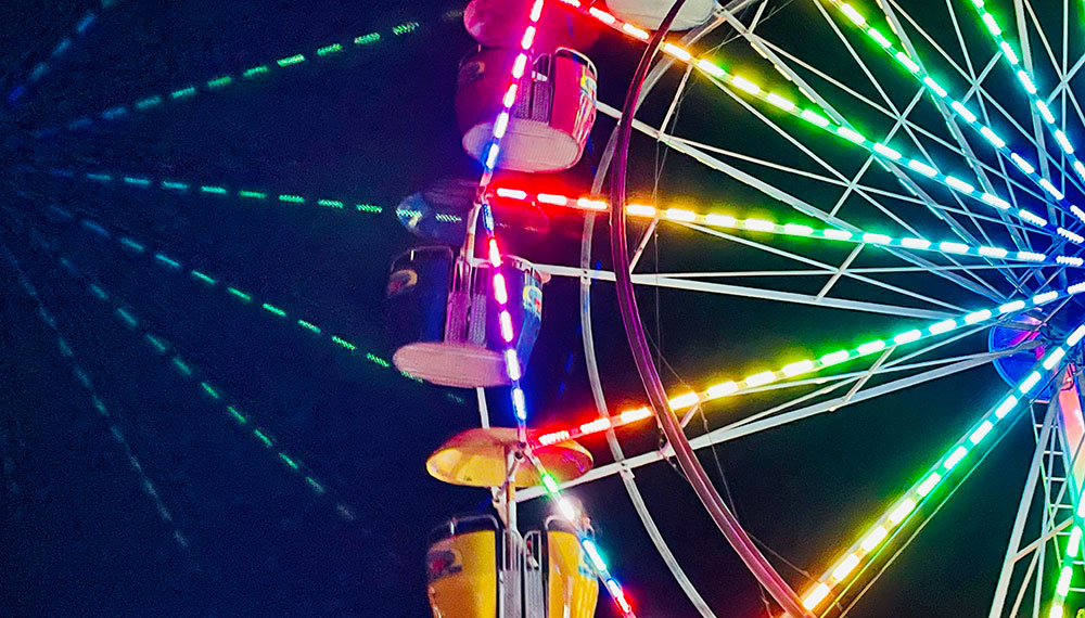 Rainbow colored ferris wheel